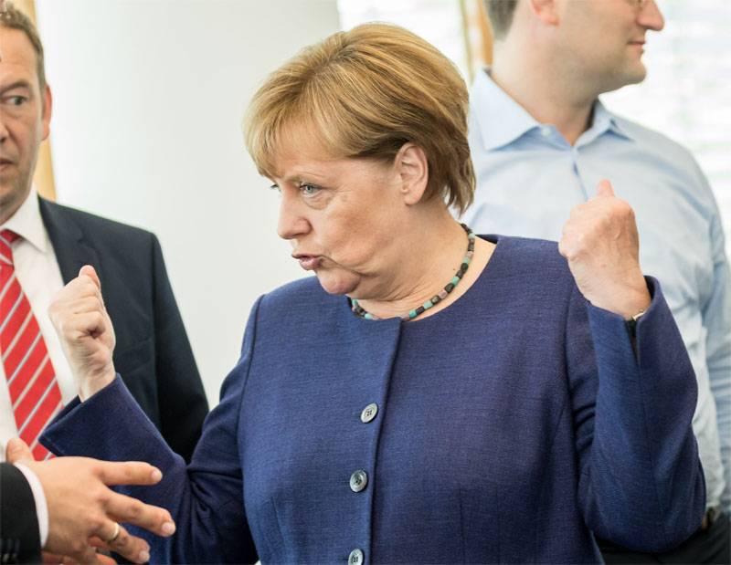 Почему Меркель убегает от российских журналистов?