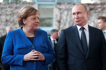 Путин и Меркель пообщались на русском языке