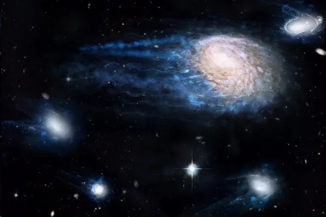 Как крупные галактики пожирают своих меньших сородичей