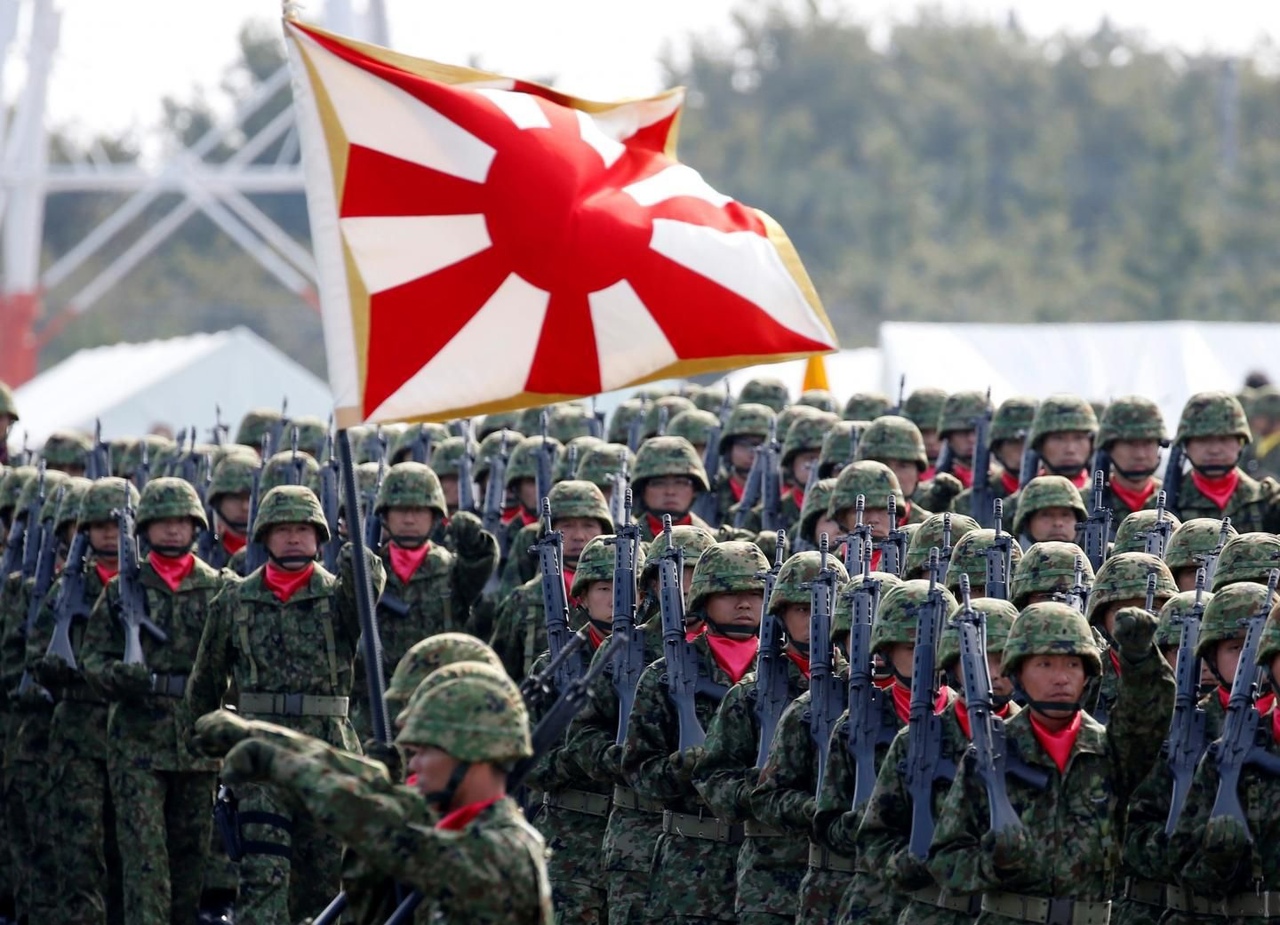 Опираясь на США, Япония меняет щит на копьё