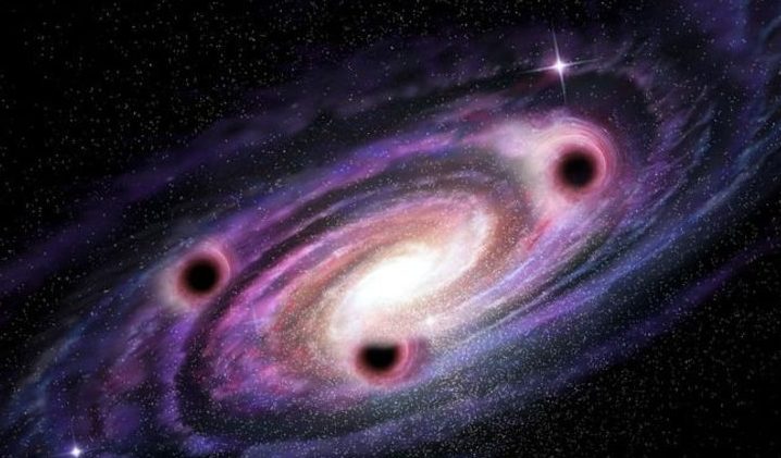 Физики: Достаточно трех взаимодействующих черных дыр, чтобы нарушить симметрию обращения времени