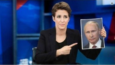 Взбешенная ведущая всю передачу тыкала в портрет Путина