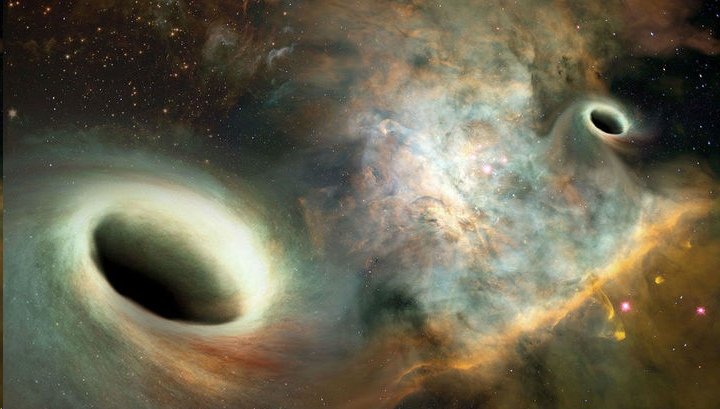 Исследователи предполагают наличие двух черных дыр в одной галактике